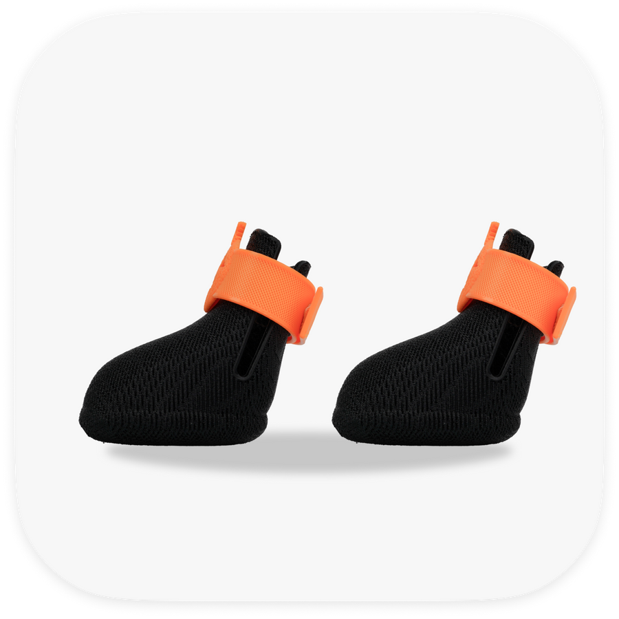 Canela ForméFit ID Halloween Pumpkin — black boots with an orange jack-o'-lantern strap, left view