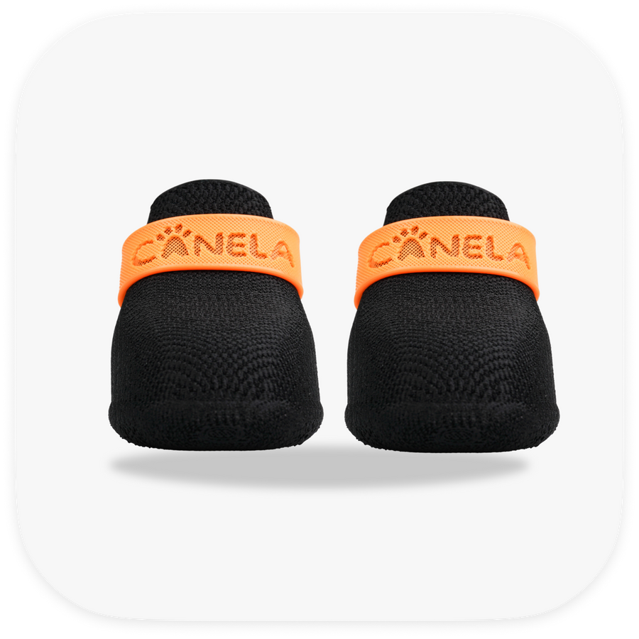 Canela ForméFit ID Halloween Black — black boots with an orange strap, front view