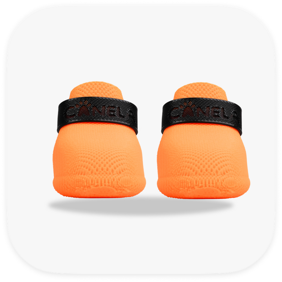 Canela ForméFit ID Halloween Orange — orange boots with a black strap, front view